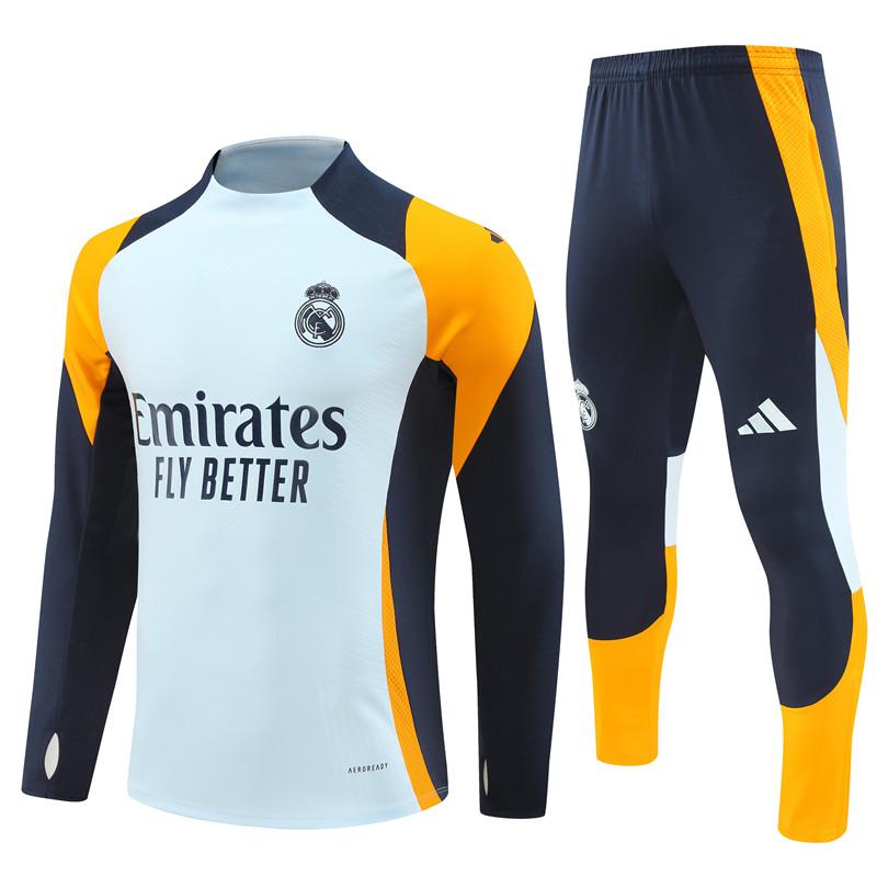 24/25 ريال مدريد أزرق فاتح/أزرق كحلي/برتقالي نصف سحاب جاكيت + بنطال طويل
