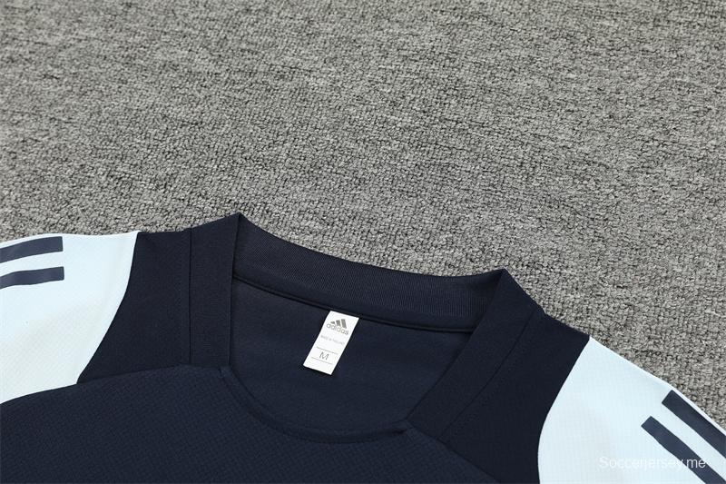 24/25 ريال مدريد قميص بأكمام قصيرة أبيض كحلي + شورت قصير الأكمام أبيض
