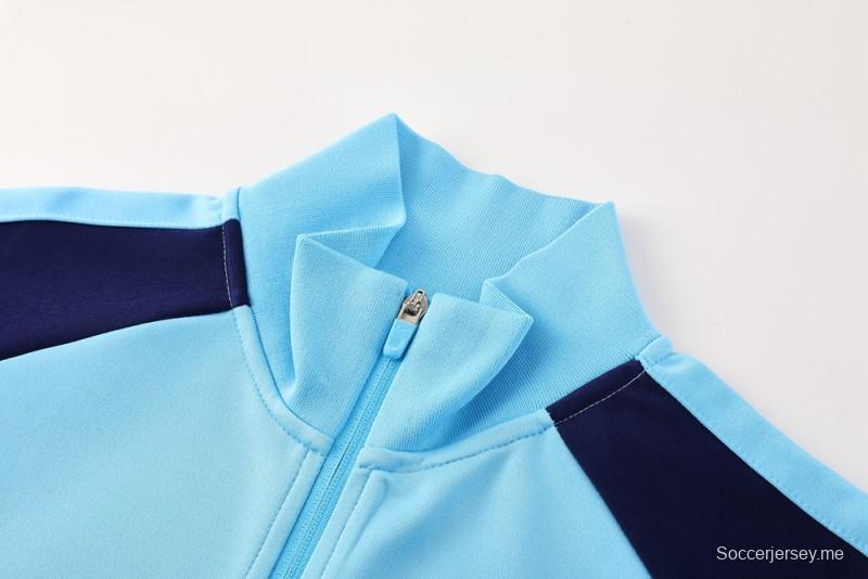 طقم بدلة رياضية نايك إير 2025 - أزرق فاتح مع لمسات كحلية اللون أزرق فاتح مع جاكيت بسحاب كامل + بنطال طويل