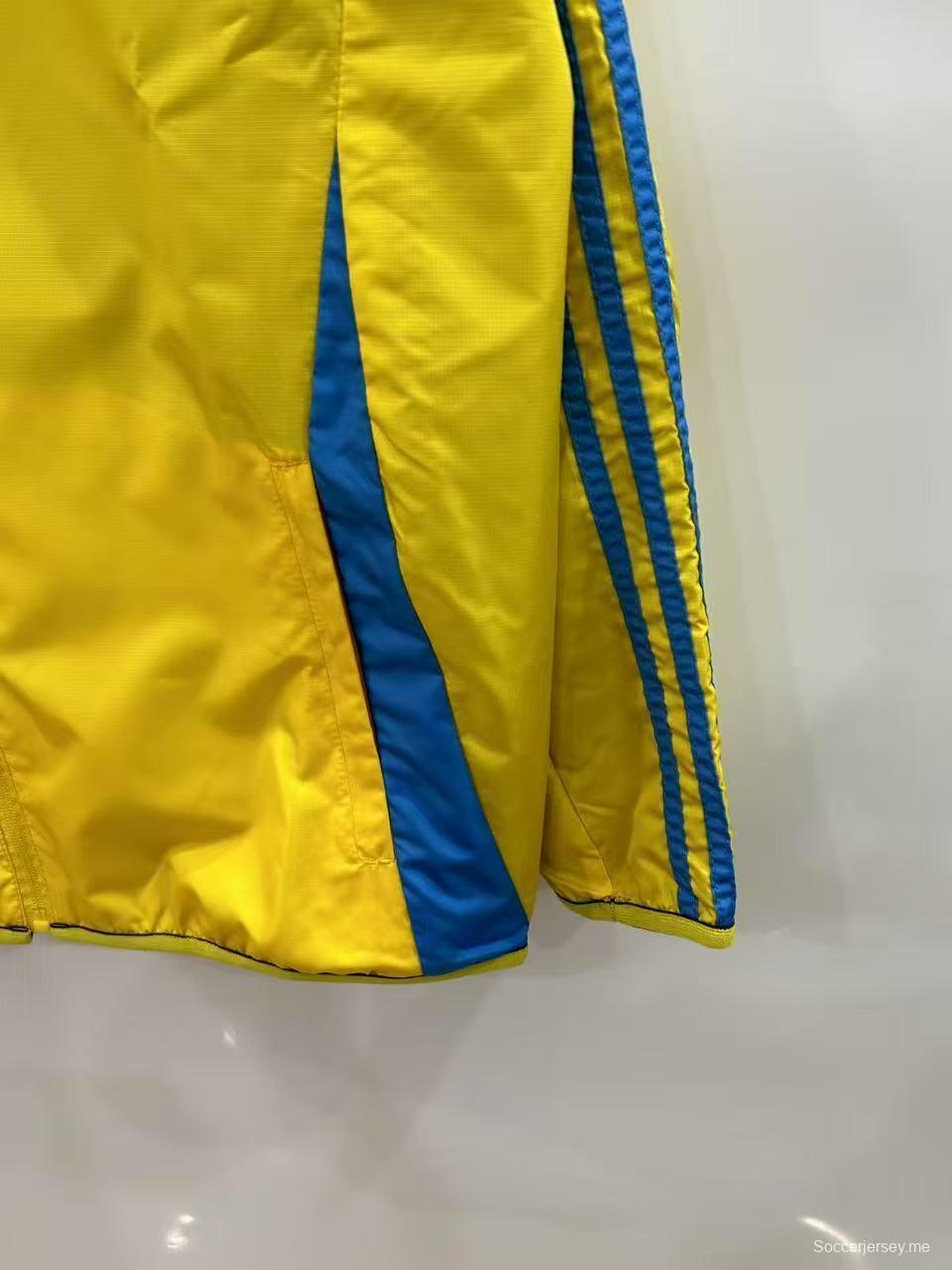 25/26 ريال مدريد أصفر/كحلي بسترة واقية من الرياح عكسية اللون أصفر/كحلي