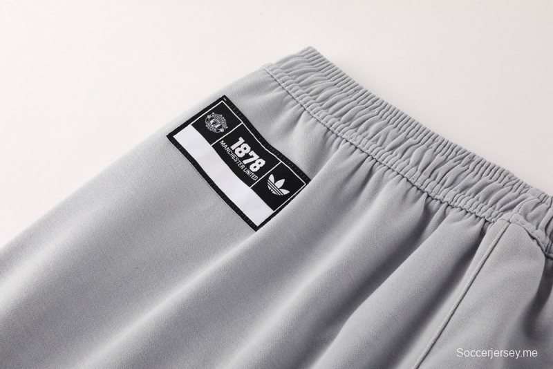 25/26 مانشستر يونايتد جاكيت نصف سحاب رمادي + بنطلون طويل S-2XL