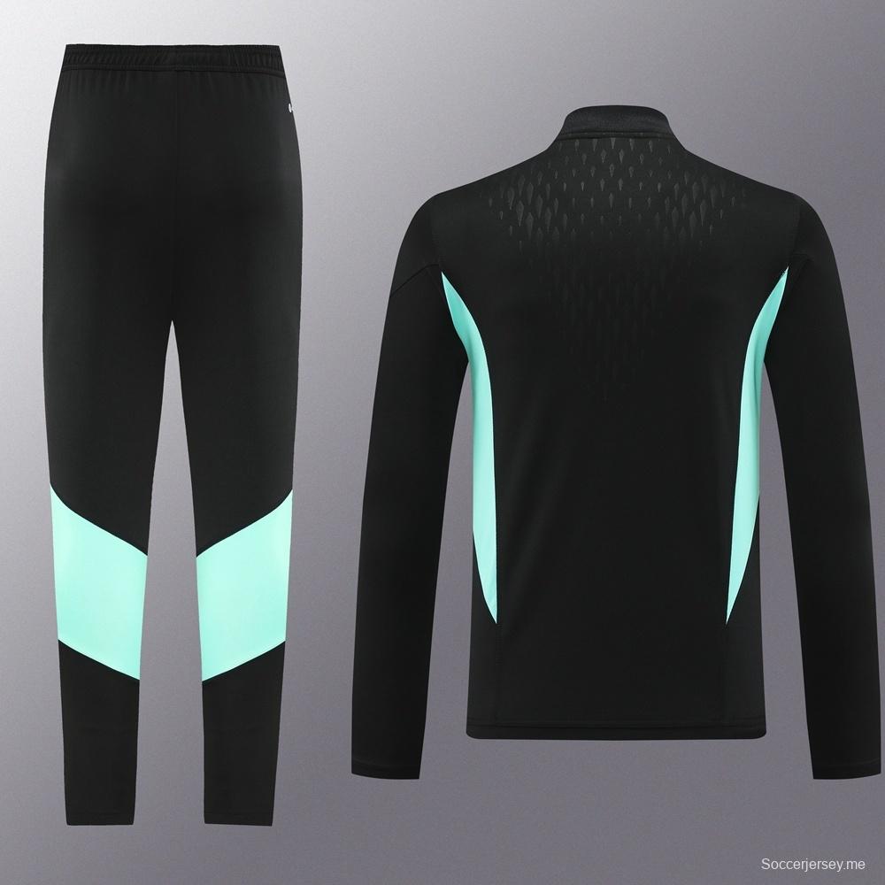 25/26 مانشستر يونايتد جاكيت أسود نصف سحاب + بنطلون طويل + بنطلون طويل