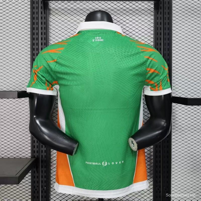 Player Version 2025 Ivory Coast Green with Elephant Graphic and Orange Trim Jersey