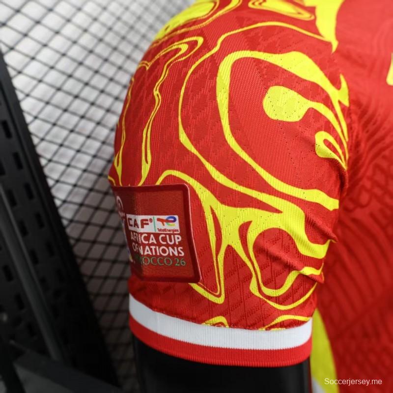 نسخة اللاعب 2026 قميص جمهورية الكونغو الديمقراطية خارج الديار باللون الأحمر والأصفر الملتهب