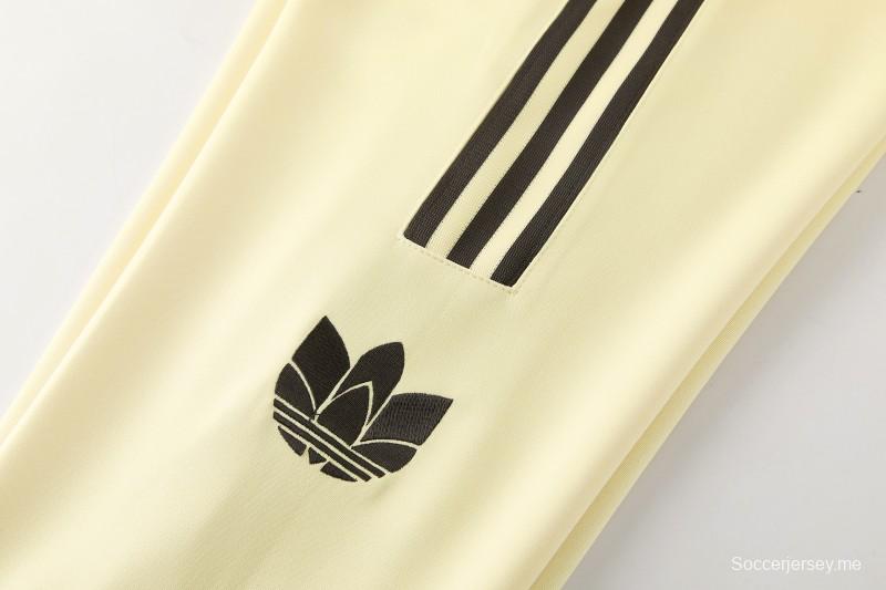 2026  سترة بأزرار كاملة + بنطال طويل من Adidas بلون المشمش