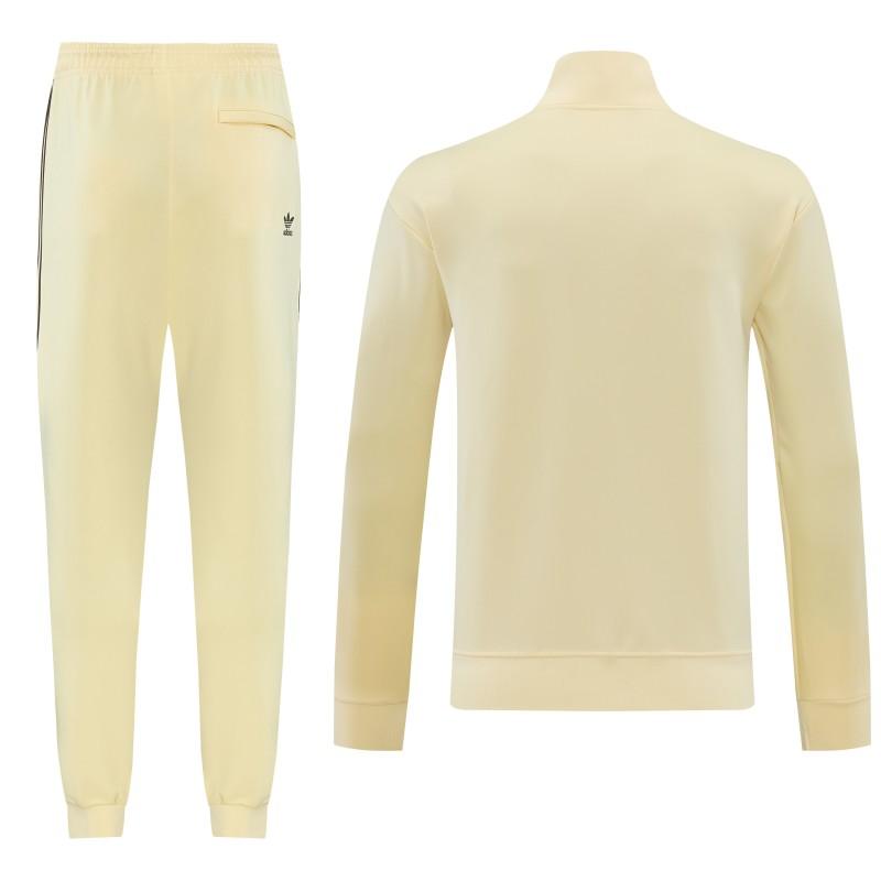 2026  سترة بأزرار كاملة + بنطال طويل من Adidas بلون المشمش