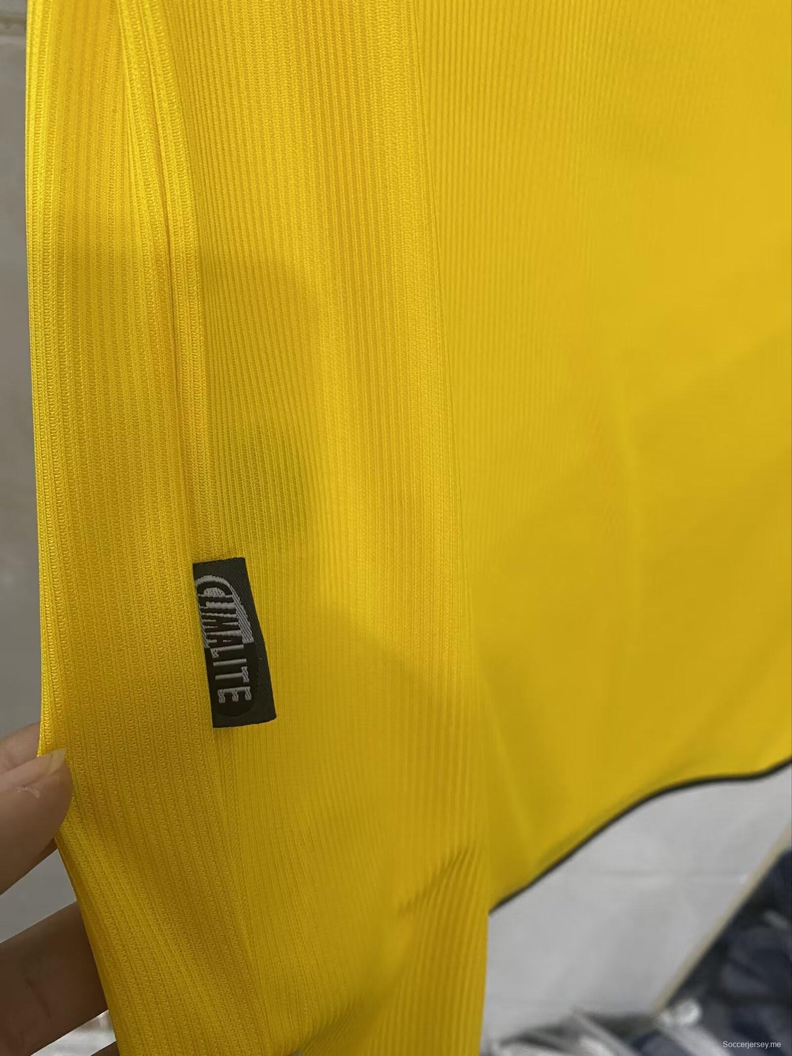 قميص أصفر عتيق 99/00 ميلان أصفر عتيق
