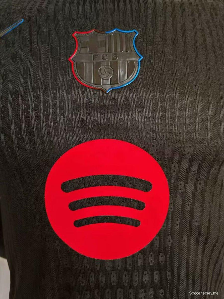 إصدار اللاعب 24/25 قميص برشلونة ذهاباً وإياباً أسود بمناسبة الذكرى 125 لتأسيس برشلونة
