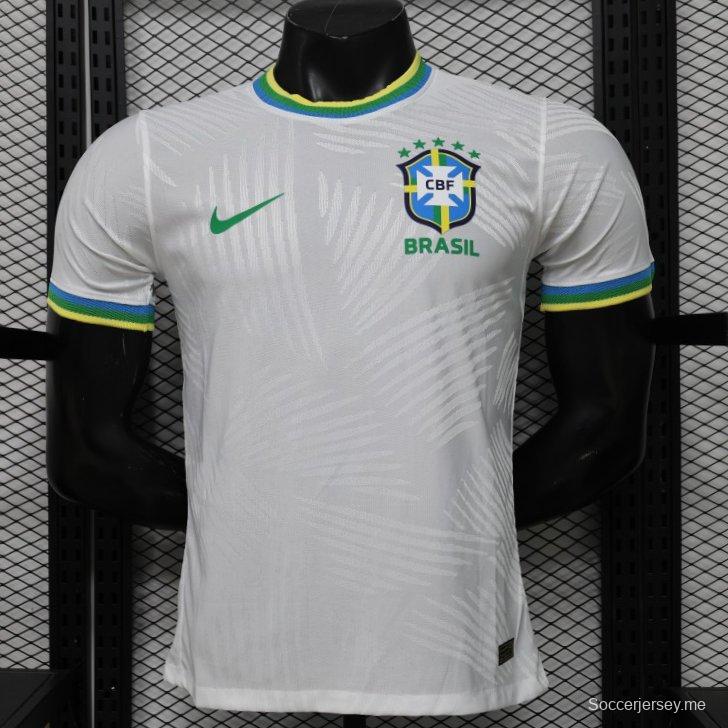 قميص اللاعب الإصدار 2026 باللون الأبيض بنمط أوراق النخيل، إصدار خاص